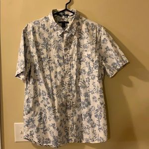 short sleeve button down shirt with floral pattern